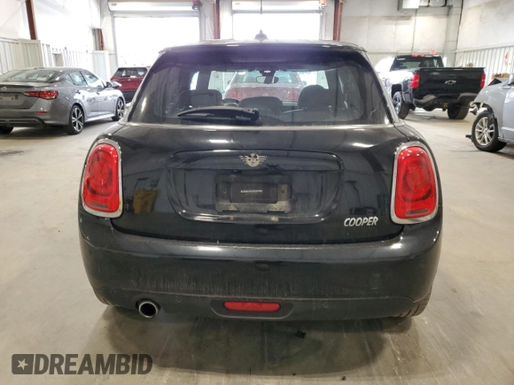 2021 MINI Hardtop 4 Door Oxford Edition with VIN WMWXU7C00M2N49230, listed as a Copart auction lot 77797914 with 51,877 mi miles and Salvage title. Bid and sale history available at DreamBid. Image 6.