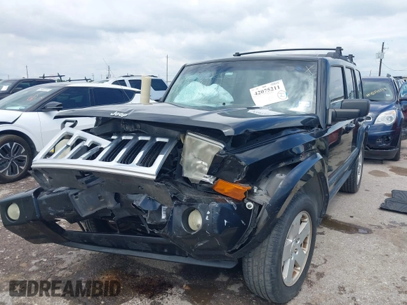 2008 Jeep Commander Sport with VIN 1J8HH48KX8C167462, listed as a IAAI auction lot 42075211 with 183,981 mi miles and . Bid and sale history available at DreamBid. Image 2.