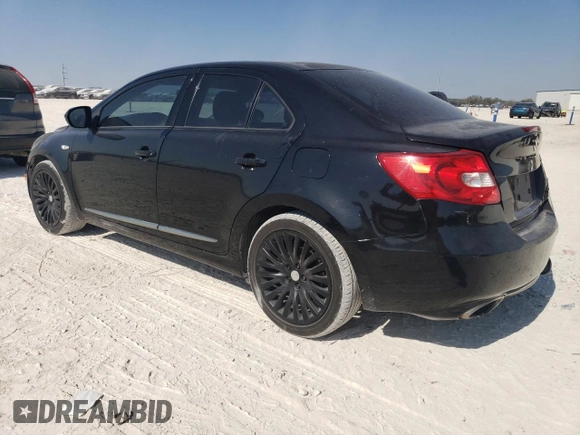 2011 Suzuki Kizashi SE z VIN JS2RE9A34B6111601, wystawiony jako Copart lot #75945784 z przebiegiem 128 926 mil mil oraz Szkoda całkowita • Salvage title. Historia ofert i sprzedaży dostępna na DreamBid. Obrazek 2.