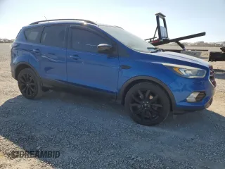2017 Ford Escape SE with VIN 1FMCU0G96HUB59479, listed as a Copart auction lot 48711935 with 94,404 mi miles and Clean Title. Bid and sale history available at DreamBid. Image 4.