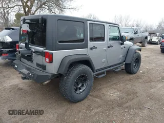 2013 Jeep Wrangler Unlimited Rubicon z VIN 1C4BJWFG7DL667083, wystawiony jako IAAI lot #42016912 z przebiegiem 148 933 mil mil oraz . Historia ofert i sprzedaży dostępna na DreamBid. Obrazek 4.
