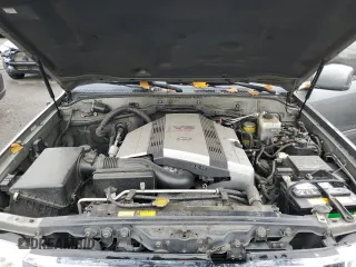 2000 Toyota Land Cruiser with VIN JT3HT05J7Y0084006, listed as a Copart auction lot 76390254 with 142,620 mi miles and Salvage Title. Bid and sale history available at carsss.com. Image 11.