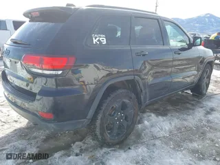 2019 Jeep Grand Cherokee Laredo E with VIN 1C4RJFAG9KC545246, listed as a IAAI auction lot 41478586 with 146,025 mi miles. Bid and sale history available at carsss.com. Image 4.
