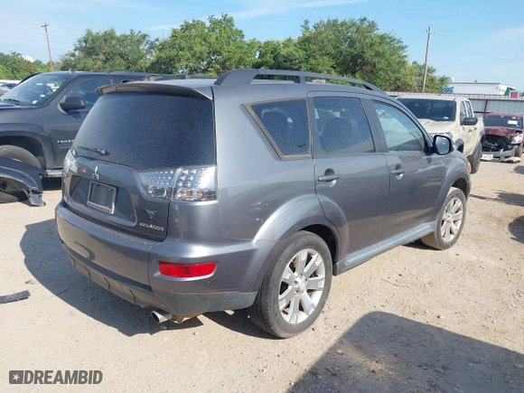 2011 Mitsubishi Outlander SE with VIN JA4AS3AWXBU022418, listed as a IAAI auction lot 40025021 with 188,695 mi miles. Bid and sale history available at carsss.com. Image 4.
