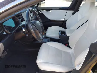 2020 Tesla Model S Long Range with VIN 5YJSA1E23LF381872, listed as a IAAI auction lot 41763046 with 96,720 mi miles and . Bid and sale history available at DreamBid. Image 24.