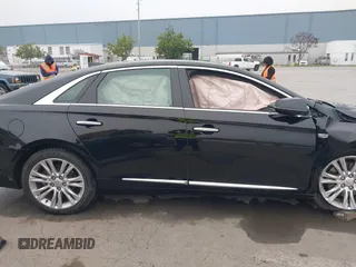 2018 Cadillac XTS Luxury with VIN 2G61M5S33J9119684, listed as a IAAI auction lot 41659807 with 107,156 mi miles and . Bid and sale history available at DreamBid. Image 12.