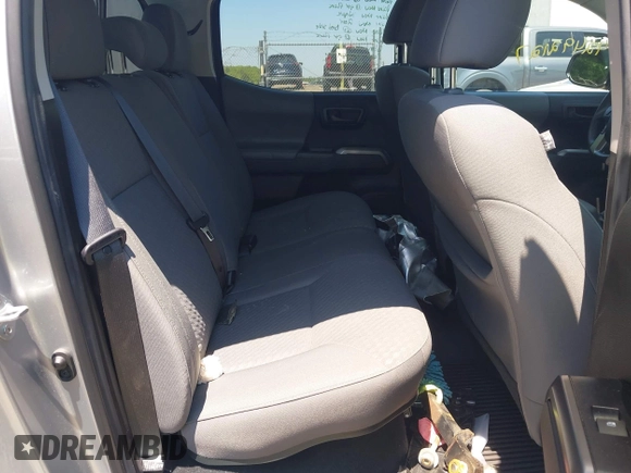 2023 Toyota Tacoma SR with VIN 3TYCZ5AN2PT141576, listed as a IAAI auction lot 42492127 with 43,431 mi miles and . Bid and sale history available at DreamBid. Image 8.