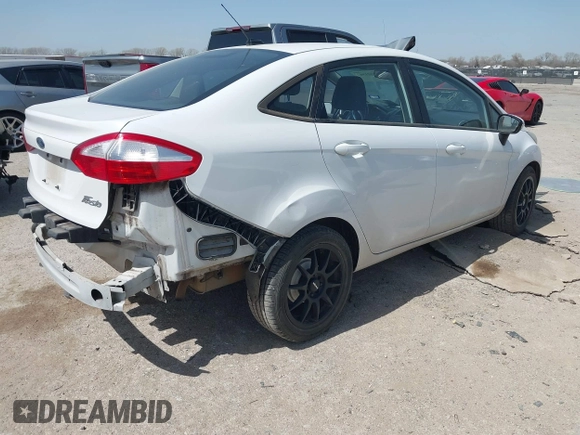 2016 Ford Fiesta SE with VIN 3FADP4BJ7GM175966, listed as a IAAI auction lot 41821964 with 100,375 mi miles. Bid and sale history available at carsss.com. Image 4.