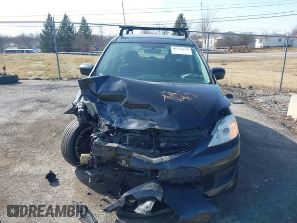 2010 Mazda 5 Sport with VIN JM1CR2WLXA0374147, listed as a IAAI auction lot 41776190 with 155,618 mi miles and . Bid and sale history available at DreamBid. Image 12.