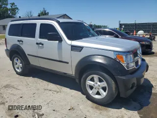 2007 Dodge Nitro SXT z VIN 1D8GT28K97W595592, wystawiony jako Copart lot #58141035 z przebiegiem 149 107 mil mil oraz Czysty tytuł • Clean title. Historia ofert i sprzedaży dostępna na DreamBid. Obrazek 4.