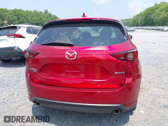 2021 Mazda CX-5 Grand Touring with VIN JM3KFBDM3M0434569, listed as a IAAI auction lot 42422349 with 25,924 mi miles and . Bid and sale history available at DreamBid. Image 16.