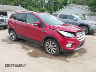 2018 Ford Escape Titanium with VIN 1FMCU9J97JUC00480, listed as a IAAI auction lot 42495804 with 491,431 mi miles and . Bid and sale history available at DreamBid. Image 1.