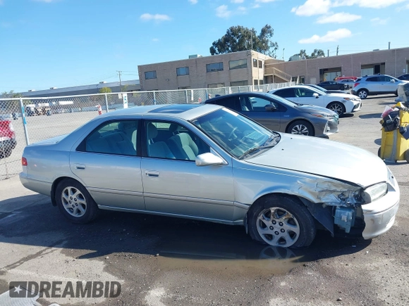 2001 Toyota Camry LE z VIN JT2BF22KX10342454, wystawiony jako IAAI lot #41939743 z przebiegiem 124 045 mil mil oraz . Historia ofert i sprzedaży dostępna na DreamBid. Obrazek 13.