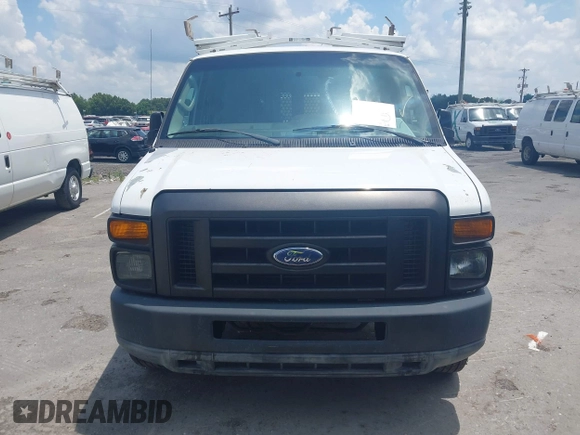 2011 Ford Econoline Cargo Commercial with VIN 1FTNE2EL4BDA70800, listed as a IAAI auction lot 42523533 with 139,962 mi miles and . Bid and sale history available at DreamBid. Image 12.