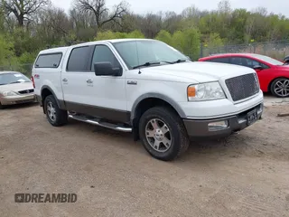 2005 Ford F-150 XLT with VIN 1FTPW14595FA87670, listed as a IAAI auction lot 42157009 with 291,713 mi miles. Bid and sale history available at carsss.com. Image 1.