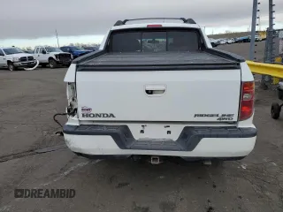 2010 Honda Ridgeline RTL with VIN 5FPYK1F58AB005088, listed as a Copart auction lot 47477975 with 128,538 mi miles and Salvage Title. Bid and sale history available at carsss.com. Image 6.