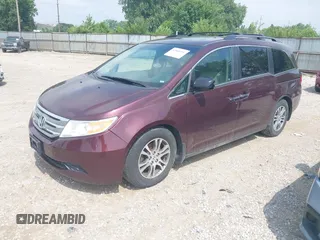 2011 Honda Odyssey EX-L with VIN 5FNRL5H6XBB096891, listed as a IAAI auction lot 42840531 with 214,842 mi miles and . Bid and sale history available at DreamBid. Image 2.