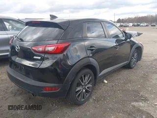 2017 Mazda CX-3 Touring with VIN JM1DKFC70H0163315, listed as a IAAI auction lot 41721515 with 144,662 mi miles. Bid and sale history available at carsss.com. Image 4.