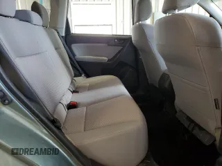2015 Subaru Forester z VIN SA0123301, wystawiony jako Copart lot #54677574 z przebiegiem 58 430 mil mil oraz Szkoda całkowita • Salvage title. Historia ofert i sprzedaży dostępna na DreamBid. Obrazek 11.