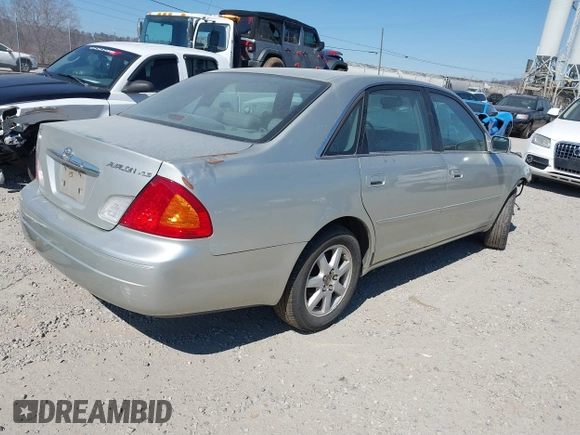 2000 Toyota Avalon XL with VIN 4T1BF28B3YU091810, listed as a IAAI auction lot 41666963 with 130,835 mi miles and . Bid and sale history available at DreamBid. Image 4.