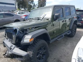 2022 Jeep Wrangler Unlimited Sport S with VIN 1C4HJXDG2NW196267, listed as a IAAI auction lot 41544282 with 18,547 mi miles. Bid and sale history available at carsss.com. Image 2.