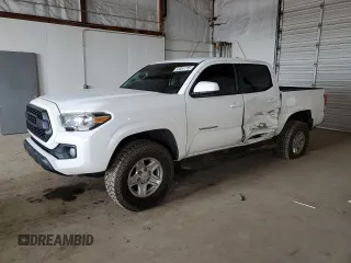 2016 Toyota Tacoma SR with VIN 3TMCZ5AN2GM020056, listed as a Copart auction lot 52351715 with 124,891 mi miles and Salvage title. Bid and sale history available at DreamBid. Image 1.