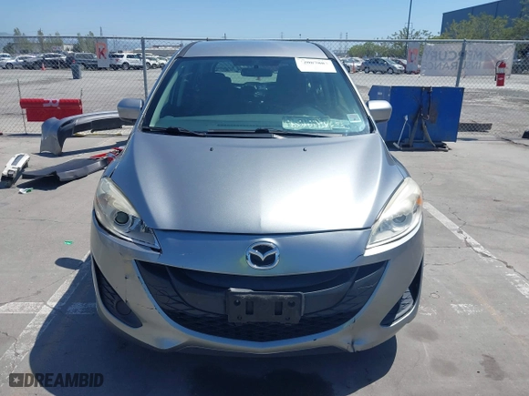 2012 Mazda Mazda5 Sport with VIN JM1CW2BL4C0103408, listed as a IAAI auction lot 42087883 with 219,601 mi miles. Bid and sale history available at carsss.com. Image 13.