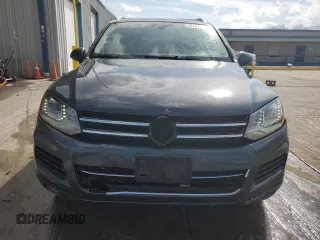 2011 Volkswagen Touareg Sport with VIN WVGFF9BPXBD005821, listed as a Copart auction lot 49391505 with 111,938 mi miles and Salvage Title. Bid and sale history available at DreamBid. Image 5.