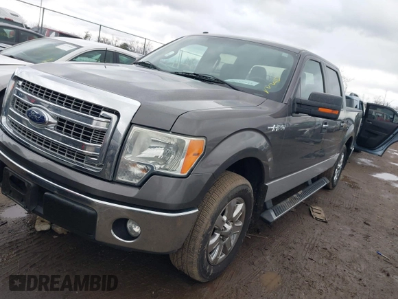 2013 Ford F-150 XL with VIN 1FTFW1CF5DKE32897, listed as a IAAI auction lot 41665756 with 101,574 mi miles. Bid and sale history available at carsss.com. Image 2.