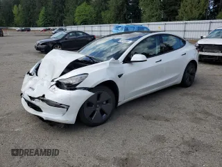 2023 Tesla Model 3 Long Range with VIN 5YJ3E1EB1PF603100, listed as a Copart auction lot 54945865 with 22,865 mi miles and Salvage Title. Bid and sale history available at DreamBid. Image 1.