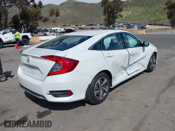 2020 Honda Civic Sedan LX with VIN 19XFC2F64LE201551, listed as a IAAI auction lot 41939055 with 67,461 mi miles. Bid and sale history available at carsss.com. Image 4.