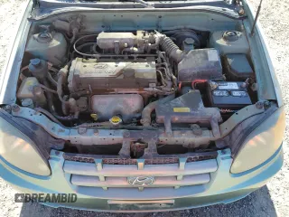 2003 Hyundai Accent GL with VIN KMHCG35C83U257641, listed as a Copart auction lot 73421464 with 143,814 mi miles and Clean Title. Bid and sale history available at carsss.com. Image 11.