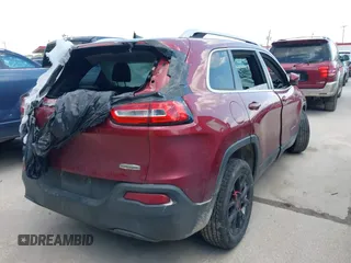 2016 Jeep Cherokee 75th Anniversary with VIN 1C4PJLCB1GW222953, listed as a IAAI auction lot 40267639 with 129,000 mi miles and . Bid and sale history available at DreamBid. Image 4.