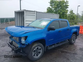 2022 Chevrolet Colorado 4WD Z71 z VIN 1GCGTDEN7N1124379, wystawiony jako IAAI lot #42372796 z przebiegiem 60 943 mil mil oraz . Historia ofert i sprzedaży dostępna na DreamBid. Obrazek 2.
