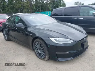 2021 Tesla Model S Plaid with VIN 5YJSA1E62MF447509, listed as a IAAI auction lot 42509281 with 32,372 mi miles and . Bid and sale history available at DreamBid. Image 6.
