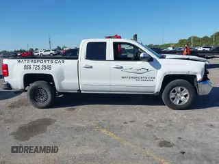 2018 Chevrolet Silverado 1500 LT with VIN 1GCRCREC1JZ153165, listed as a IAAI auction lot 41737258 with 130,475 mi miles and . Bid and sale history available at DreamBid. Image 14.