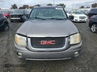 2005 GMC Envoy SLT with VIN 1GKDS13S852320018, listed as a Copart auction lot 80496544 with 237,451 mi miles and Salvage Title. Bid and sale history available at carsss.com. Image 5.
