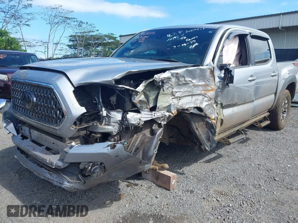 2018 Toyota Tacoma SR z VIN 3TMCZ5AN7JM156092, wystawiony jako IAAI lot #41642391 z przebiegiem 65 805 mil mil oraz . Historia ofert i sprzedaży dostępna na DreamBid. Obrazek 6.