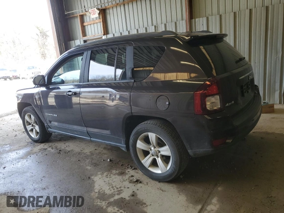 2014 Jeep Compass Latitude with VIN 1C4NJDEB1ED661332, listed as a Copart auction lot 53958985 with 116,020 mi miles and Salvage Title. Bid and sale history available at DreamBid. Image 2.