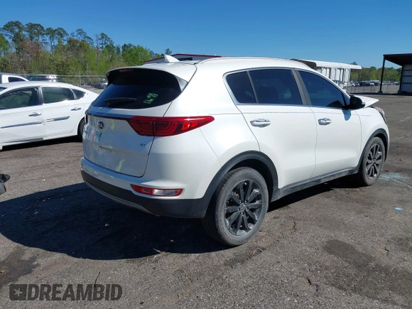2018 Kia Sportage EX with VIN KNDPN3ACXJ7470734, listed as a IAAI auction lot 41859915 with 123,918 mi miles and . Bid and sale history available at DreamBid. Image 4.