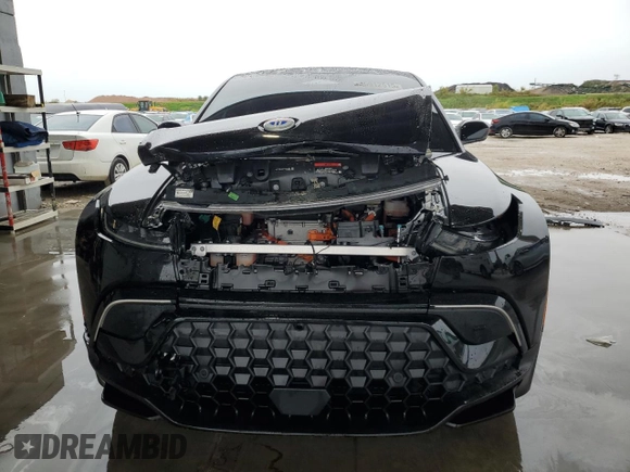 2023 Fisker Ocean Extreme z VIN VCF1EBU26PG009252, wystawiony jako Copart lot #45912515 z przebiegiem 12 234 mil mil oraz Szkody całkowita. Historia ofert i sprzedaży dostępna na DreamBid. Obrazek 5.