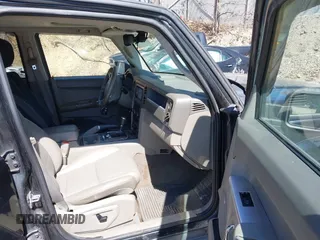 2009 Jeep Commander Sport with VIN 1J8HG48P79C541817, listed as a IAAI auction lot 41906053 with 189,436 mi miles. Bid and sale history available at carsss.com. Image 5.