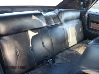 1969 Cadillac DeVille z VIN F9206444, wystawiony jako Copart lot #77397244 z przebiegiem 5 217 mil mil oraz Szkoda całkowita • Salvage title. Historia ofert i sprzedaży dostępna na DreamBid. Obrazek 10.