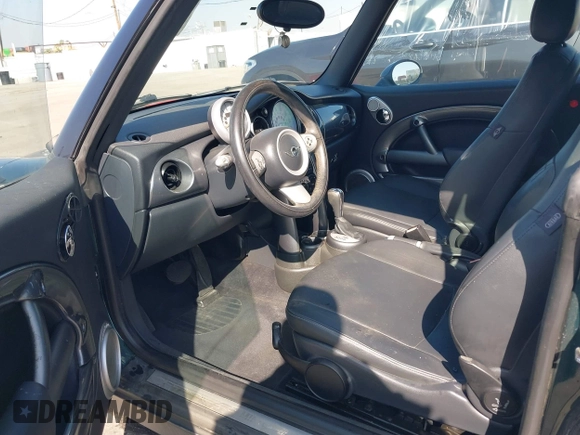 2006 MINI Convertible with VIN WMWRF33566TG15710, listed as a IAAI auction lot 41636955 with Not Provided miles and . Bid and sale history available at DreamBid. Image 5.