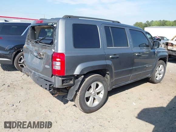 2014 Jeep Patriot Latitude with VIN 1C4NJPFA4ED535148, listed as a IAAI auction lot 42037942 with 192,493 mi miles and . Bid and sale history available at carsss.com. Image 4.