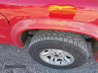 2003 Dodge Dakota Sport with VIN 1D7HL38N73S299948, listed as a IAAI auction lot 41392261 with 271,377 mi miles. Bid and sale history available at carsss.com. Image 6.