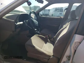1995 Ford Escort z VIN 3FASP15J0SR164269, wystawiony jako Copart lot #75297324 z przebiegiem 95 548 mil mil oraz Tytuł czysty. Historia ofert i sprzedaży dostępna na DreamBid. Obrazek 7.