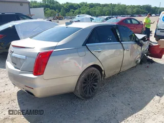 2015 Cadillac CTS Luxury AWD with VIN 1G6AX5SX7F0133440, listed as a IAAI auction lot 42560857 with 82,910 mi miles and . Bid and sale history available at DreamBid. Image 4.