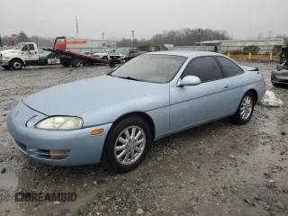 1995 Lexus SC 400 z VIN JT8UZ30CXS0039926, wystawiony jako Copart lot #89373825 z przebiegiem 252 843 mil mil oraz Szkody całkowita. Historia ofert i sprzedaży dostępna na DreamBid. Obrazek 1.