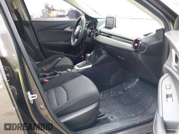2016 Mazda CX-3 Sport z VIN JM1DKBB75G0114507, wystawiony jako IAAI lot #41858416 z przebiegiem 152 822 mil mil oraz . Historia ofert i sprzedaży dostępna na DreamBid. Obrazek 5.